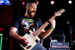 Ryan Postlethwait (Mega Beardo) rocking the NES guitar 1
