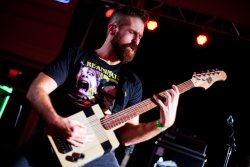Ryan Postlethwait (Mega Beardo) rocking the NES guitar 2
