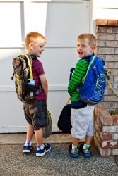 Will and Andrew show off their backpacks
