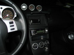 Neo Car Jukebox remote display installed in the cubby