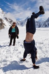 Tori does a handstand on a glacier