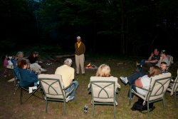 Bob tells a story around the campfire