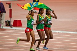 Ethiopian women's steeplechase team celebrates their bronze medal