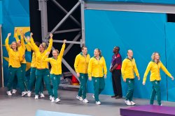 Australia's Women's Water Polo team enters the medal ceremony