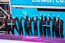 USA Women's Water Polo team celebrates gold in the medal ceremony (1)