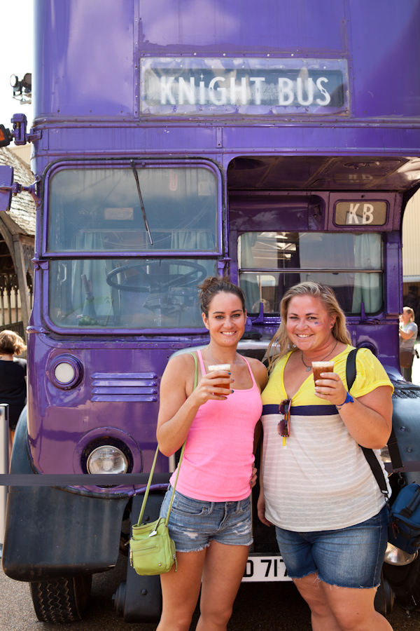 Tori and Jessie enjoy Butterbeer in front of the Knight Bus